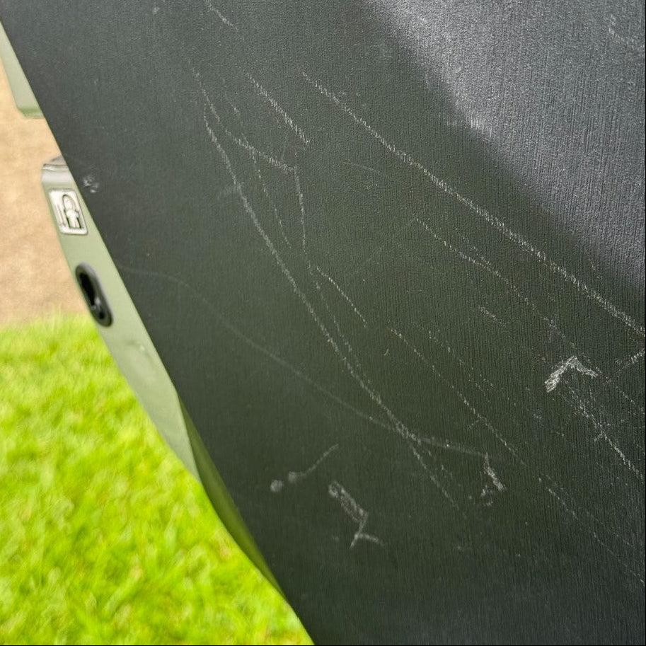 Scratched car door panel before repair in Sydney