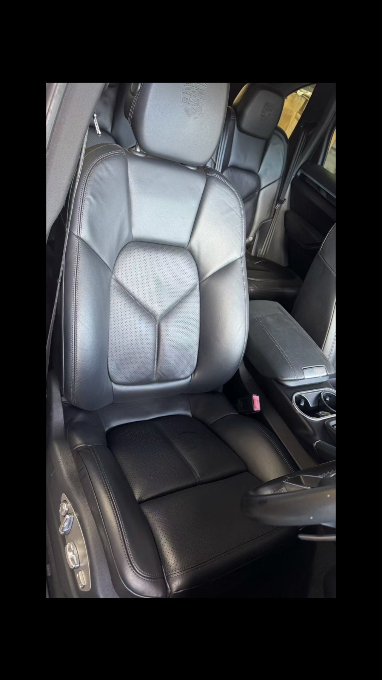 Worn Porsche driver seat with surface wear and creases after repair in Sydney